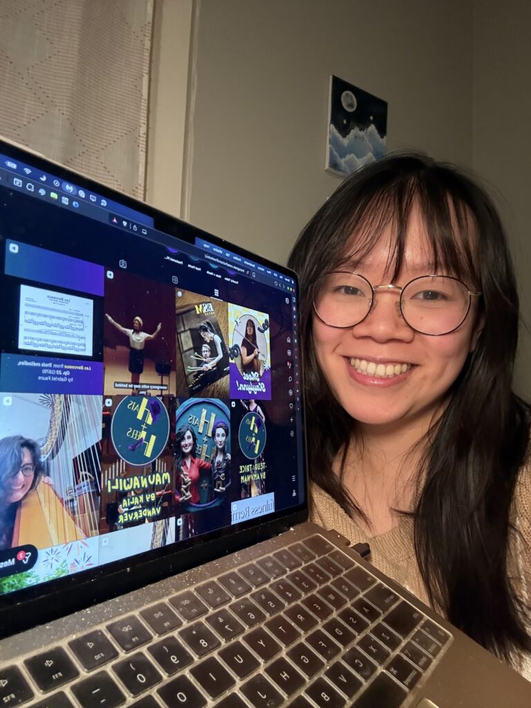 Kaylynn Li shows off the digital media she is working with during the internship.