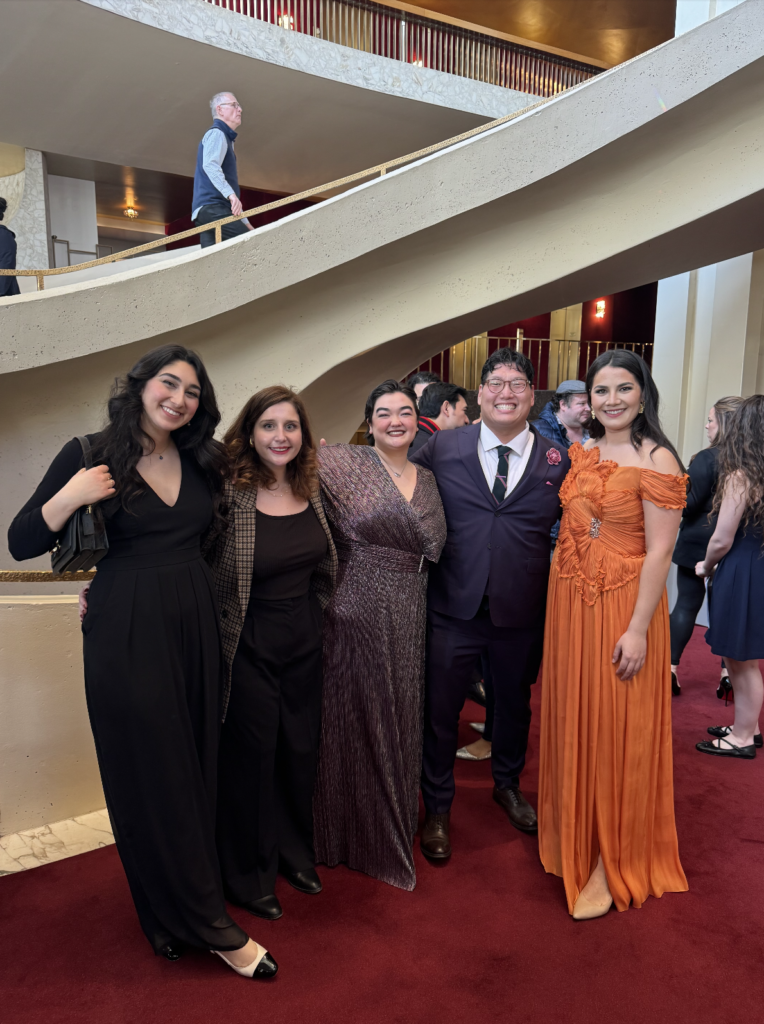 Nicole Khouzami attends the Metropolitan Opera National Council Finals with the team from Strategem during an internship.